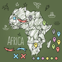 Doodle Africa map on green chalkboard with pins and extras