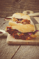 Barbeque Pulled Pork Sandwich with BBQ Sauce.
