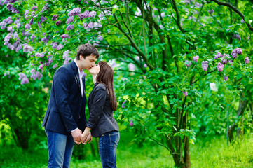 Young kissing happy couple in love