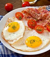 English breakfast - toast, egg, bacon and vegetables