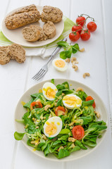 Lamb's lettuce salad with eggs and nuts