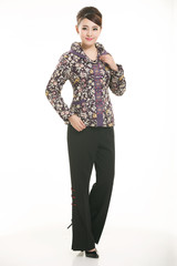 Fototapeta premium Wearing Chinese clothing waiter in front of a white background