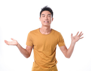 Closeup portrait of wild, goofy, crazy, funny, shocked surprised stunned young man face with hands in air