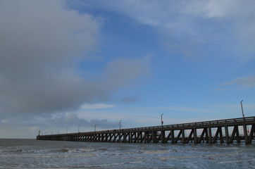 Fototapeta na wymiar long pier into sea on Belgian coast