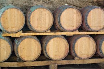 wooden barrels in  winemaker cellar