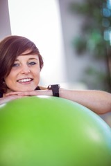 Fototapeta premium Fit woman leaning on exercise ball