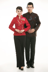 Wearing Chinese clothing waiter in front of a white background