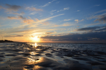 Fototapeta na wymiar sunset over beach, Belgian seaside