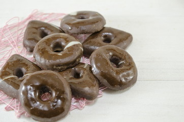 Bunch of chocolate cookies on a tablecloth