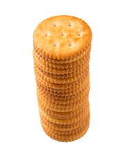 Round salted cracker over white background