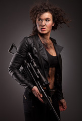 Fototapeta premium Sniper woman. With blood drop on face.