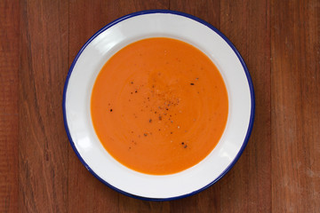 tomato soup in white plate