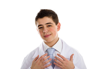 hands facing chest gesture by boy doctor