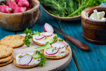 Helathy spring breakfast,crackers with fresh vegetables