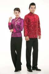 Wearing Chinese clothing waiter in front of a white background