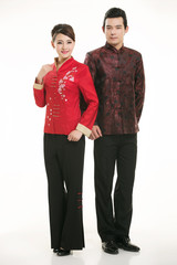 Wearing Chinese clothing waiter in front of a white background