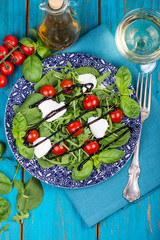 Healthy diet salad with tomatoes, mozzarella,basil and balsamic
