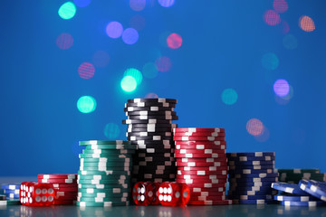 Chips for poker on shiny background