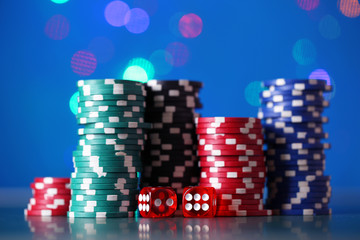 Chips for poker on shiny background