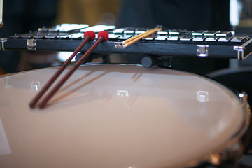Drum sticks on percussion instruments