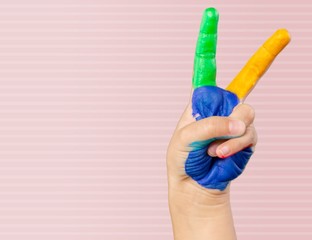 Arm. Painted children's hands in different colors with smilies