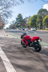 Foto op Canvas Sport motorcycle stands on the sidewalk in Melbourne, Australia. © niklebedev51
