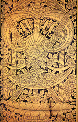 Traditional Thai art on a window shutter in a temple