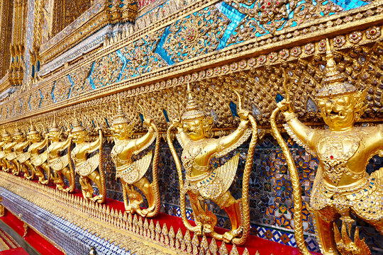 Golden statue at Wat Phra Kaew, Temple of the Emerald Buddha. Th