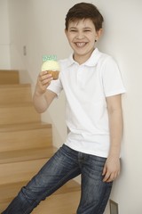 Little boy gives cookie to dad