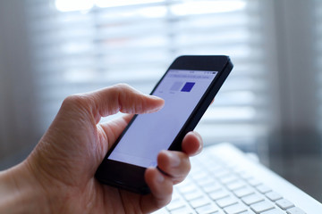 hand with smartphone