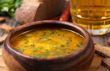 Traditional beer soup with sausage croutons dill and beer on vin