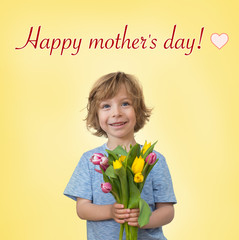 Little boy holding a tulips bouquet