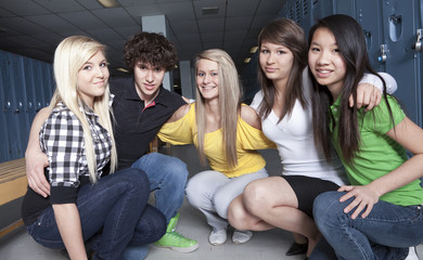 Obraz premium Friends posing in a cloakroom. Nice portrait.