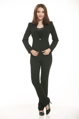 Young Asian women wearing a suit in front of a white background