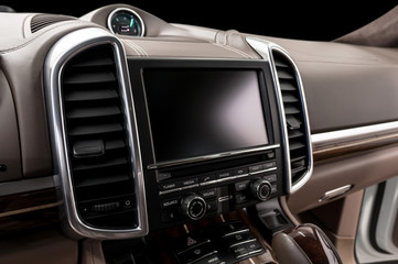 Modern car dashboard. Screen multimedia system. Interior detail.