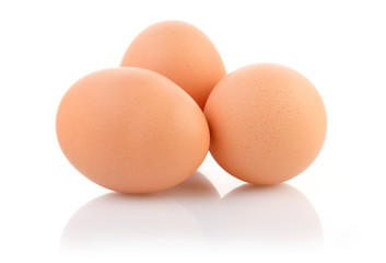 Three eggs isolated on white background