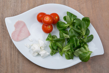 Healthy food for diet as bread salad, tomatoes, eggs, ham,  
