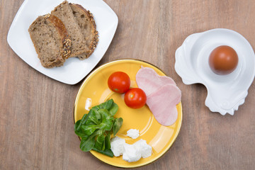 Healthy food for diet as bread salad, tomatoes, eggs, 