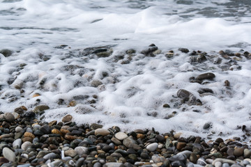 Sea waves on a pebbly shore
