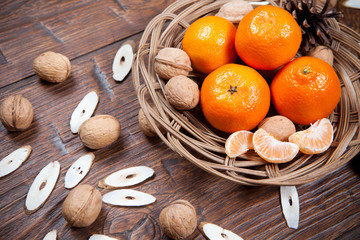 Fototapeta na wymiar Tangerines on wooden table