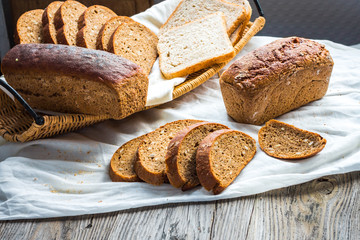assortment of baked bread, slices of rye bread, bran cereal, rus