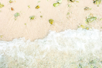 Wave of the sea on the sand beach