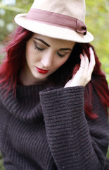 A beautiful woman wearing a hat