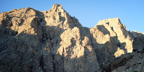 View of Distant Peaks. Sunset View. High mountains vintage effec