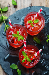 Red Cocktail with mint and ice