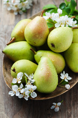 Sweet fresh pears on the wooden table