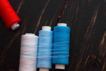 four spools of thread