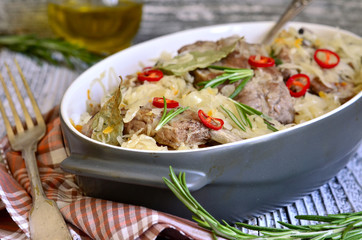 Pork ribs stewed with sour cabbage.