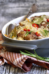 Pork ribs stewed with sour cabbage.