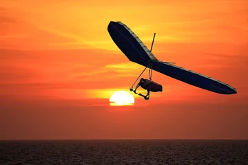 Fototapeten Hang Glider at sunset © Jenny Thompson